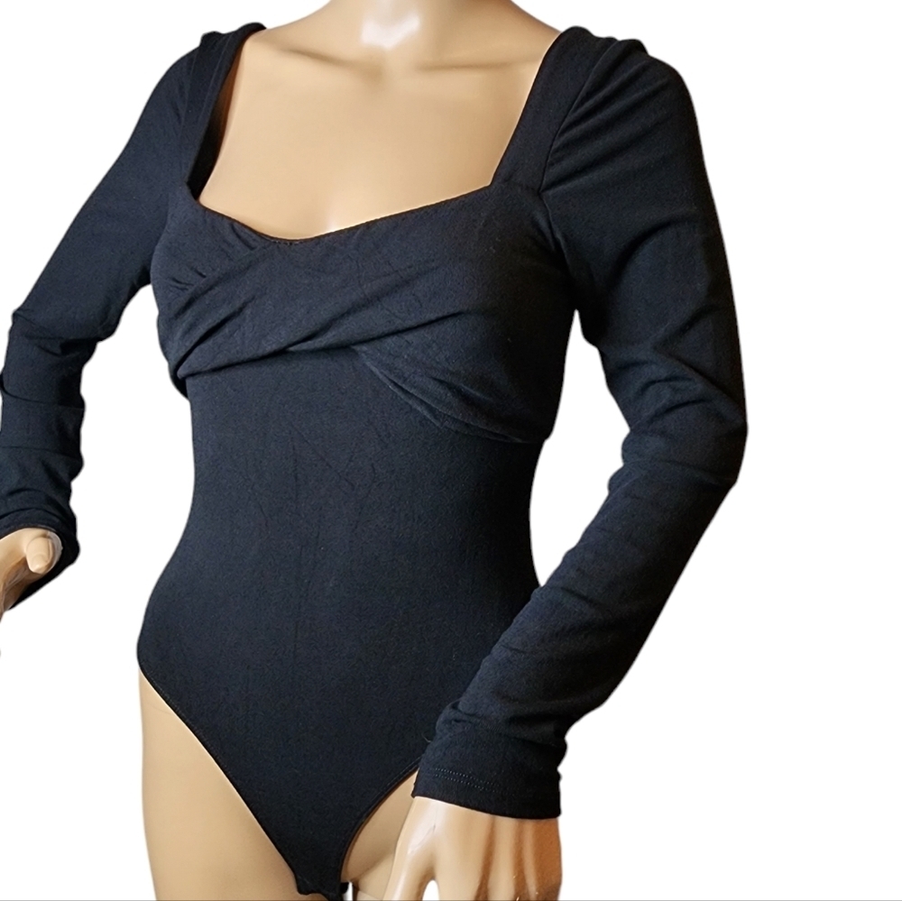 ASTR black stretch long sleeve bodysuit. Size small.